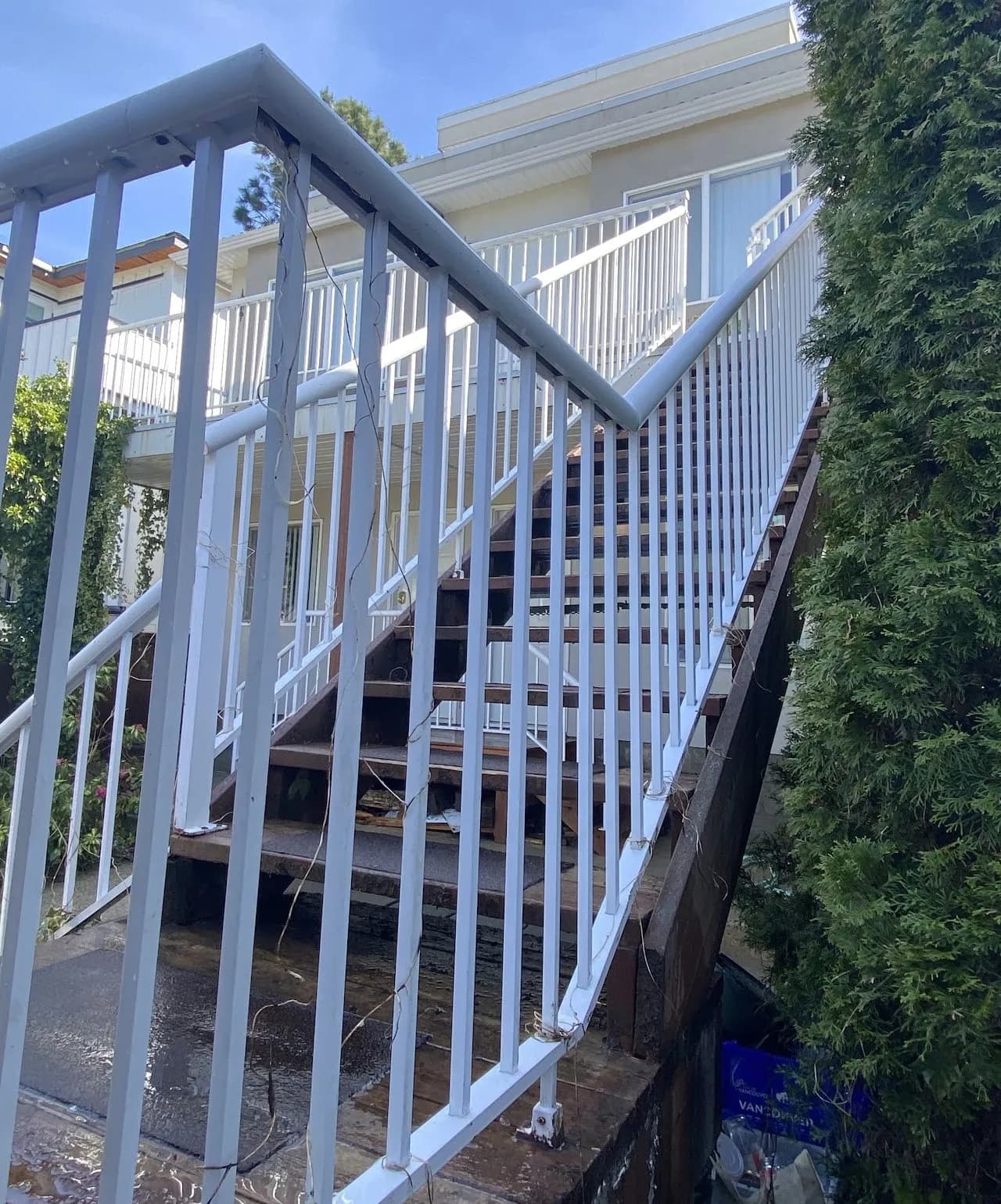 The same balcony railing glass after cleaning