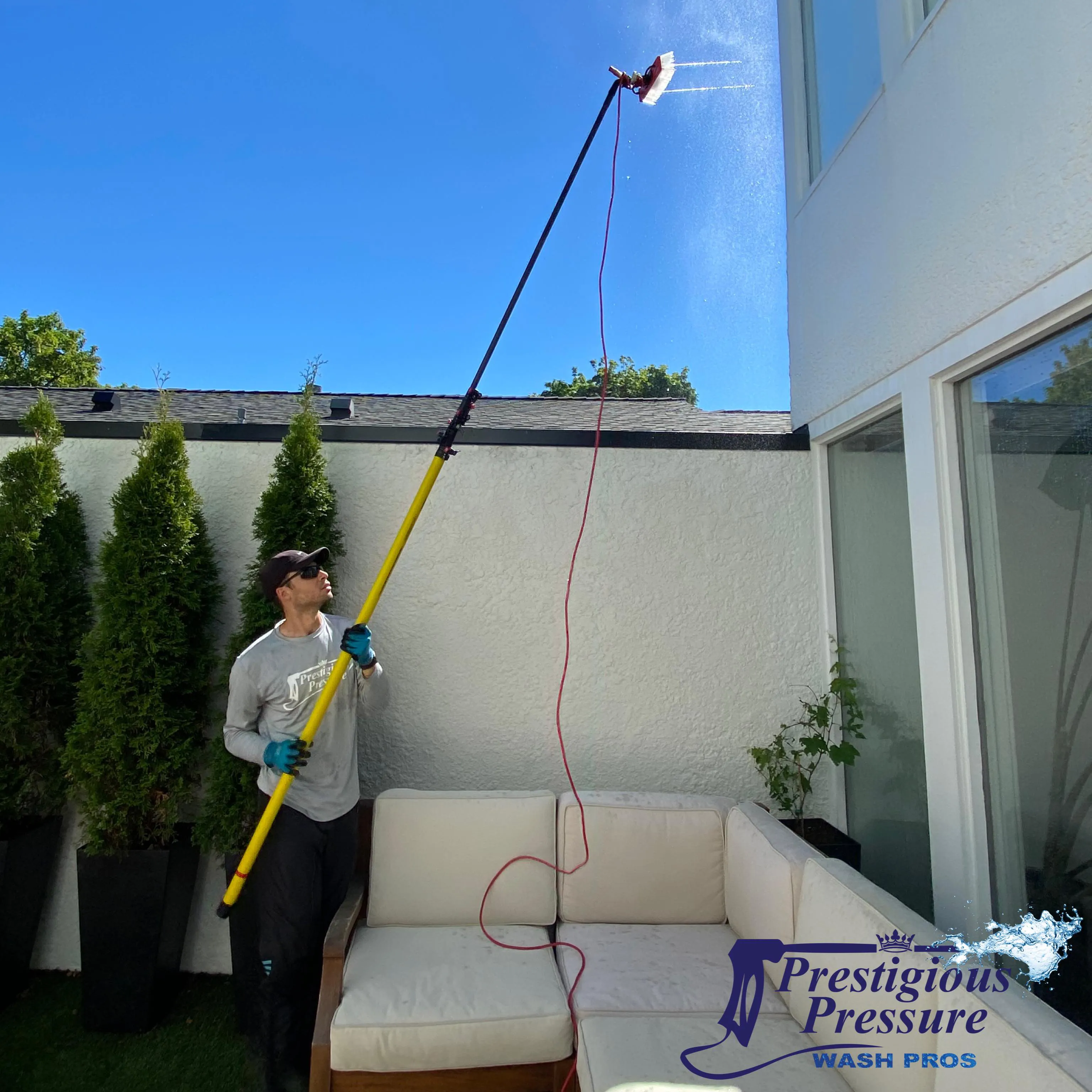 Exterior window cleaning on a home in Burnaby, BC